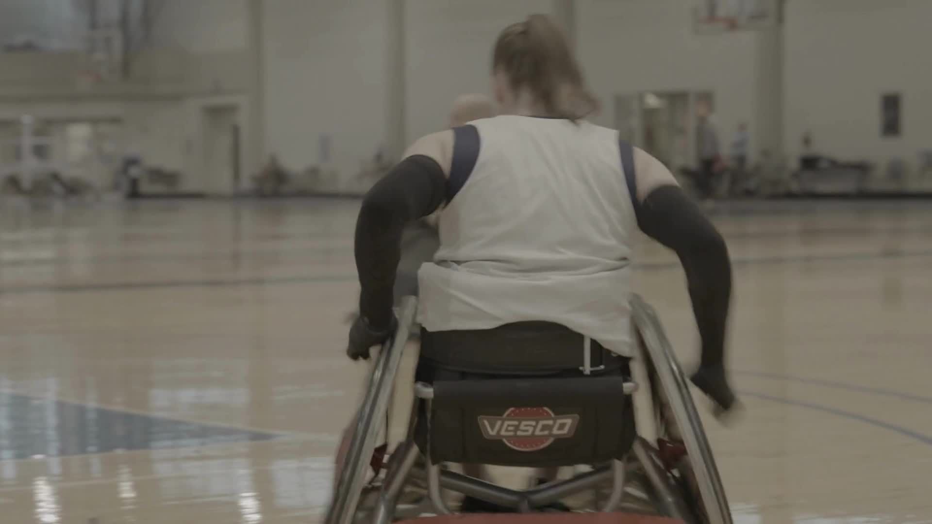 SLU professor Sarah Adam practices with Paralympics rugby team